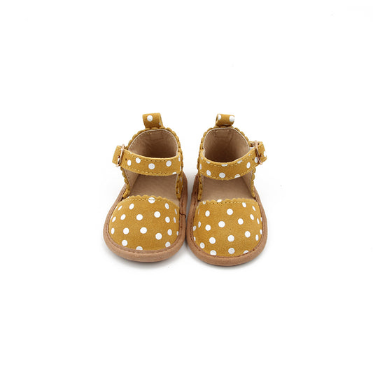 Mustard and white polka dot, baby mary janes. 