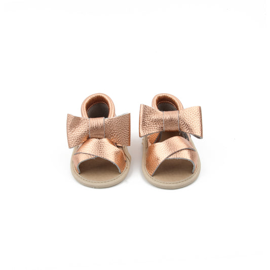 Baby bow, rose gold sandals. 
